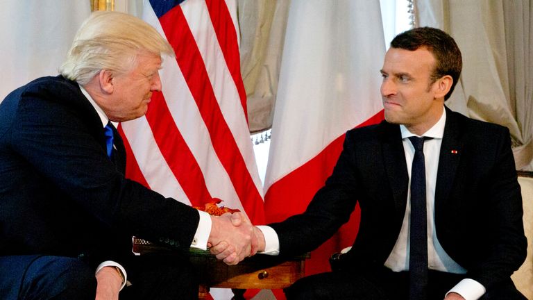 Trump and Macron handshake