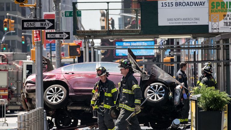 The wrecked car in the intersection of 45th and Broadway in Times Square