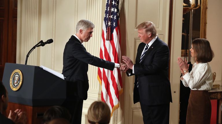 Trump and Gorsuch handshake