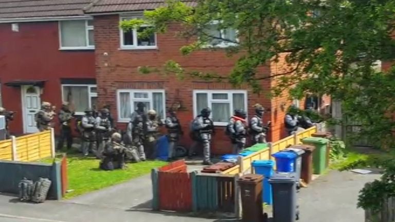 An image taken by a neighbour of the home in Fallowfield, Manchester, that was raided by police