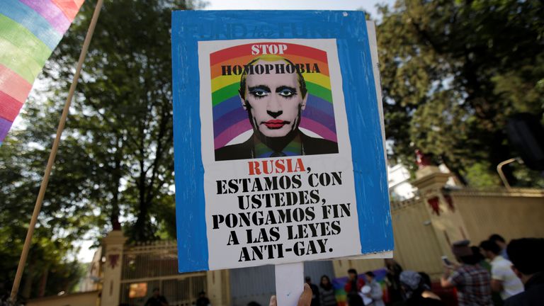 A member of the LGBT community, holds a placardduring a protest outside the Russian embassy, for the constant discrimination and violence against the gay community in Chechnya and other regions of Russia, in Mexico City, Mexico April 19, 2017