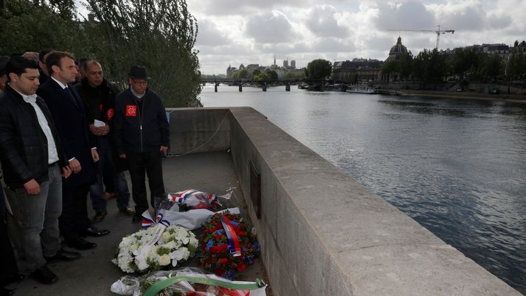Emmanuel Macron with the son of a Moroccan man killed during a National Front march in 1995