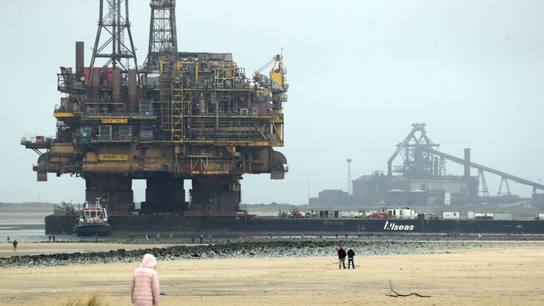 The Shell Brent Delta platform is brought to Able UK shipyard in Hartlepool on a barge to be decommissioned in 2017