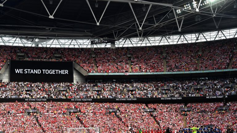 Everyone in the stadium observed a minute's silence