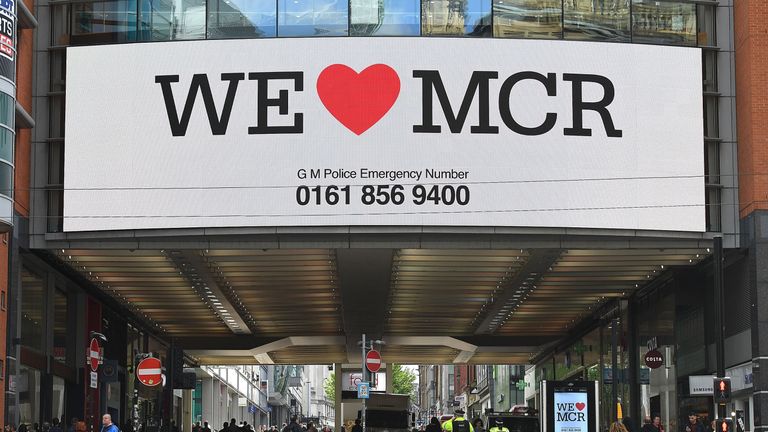 A sign saying &#39;We love Manchester&#39; is displayed 