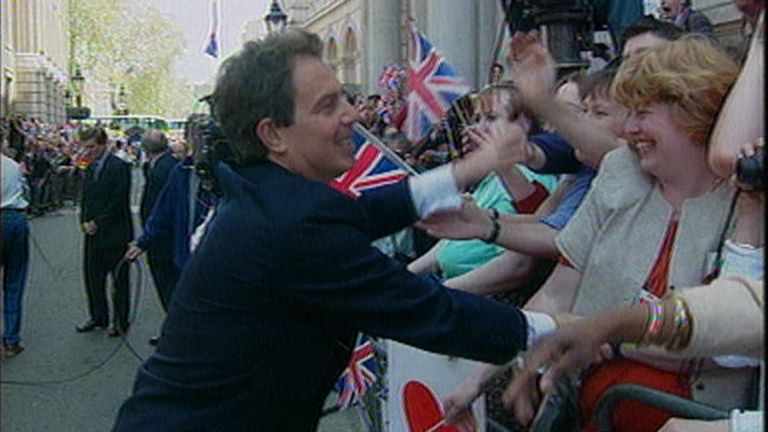 Tony Blair is congratulated after the Labour Party wins the 1997 election