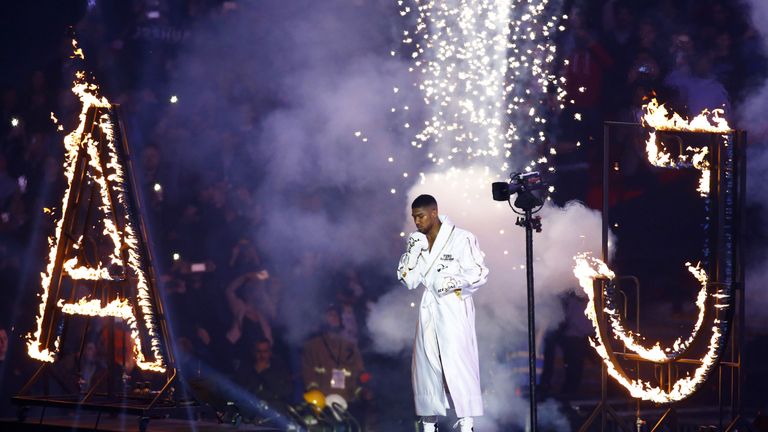 Anthony Joshua makes his entrance before the Wembley fight