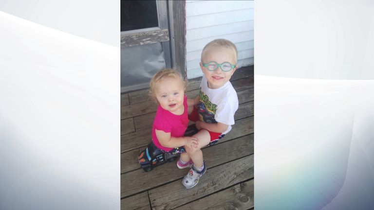 The boy, four, and his younger sister were swept away by floodwaters