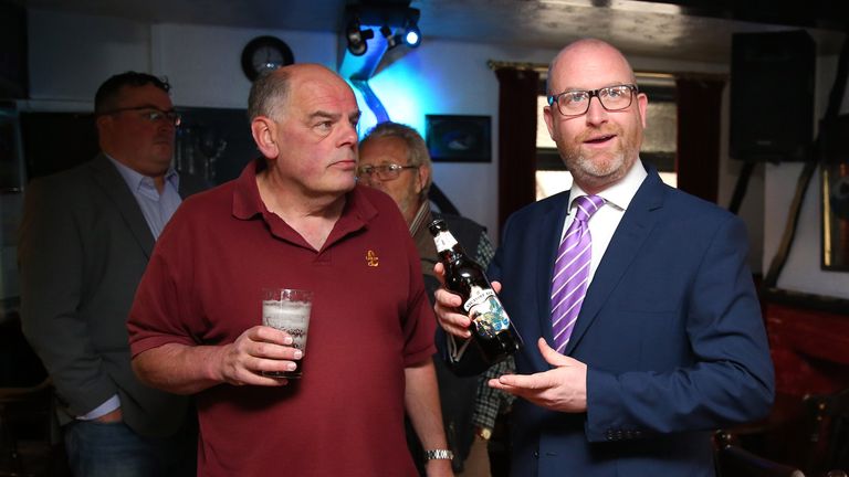 UKIP leader Paul Nuttall enjoying a beer while campaigning, much like his predecessor, Nigel Farage
