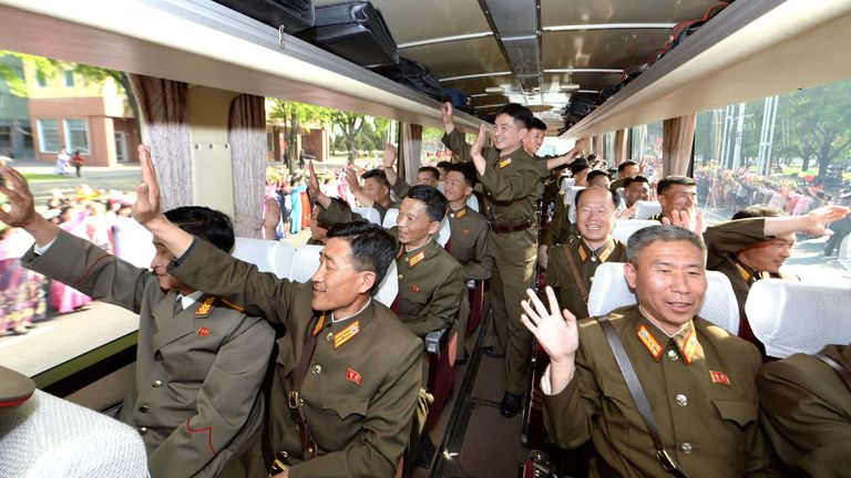 Developers of the ground-to-ground medium-to-long range strategic ballistic rocket Hwasong-12 arrive in Pyongyang