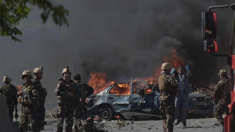 Security forces near the area where the car bomb exploded