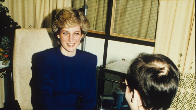 Princess Diana holding the hand of an AIDS patient in Middlesex. REX/Shutterstock