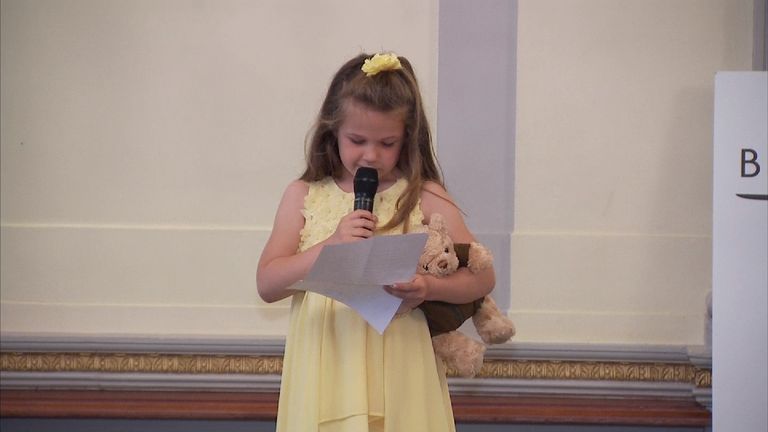 Maya, 6, read her letter in front of an audience of around 200 people