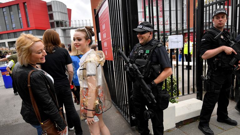 Armed police at Old Trafford Cricket Ground as fans arrive for the Courteeners concert