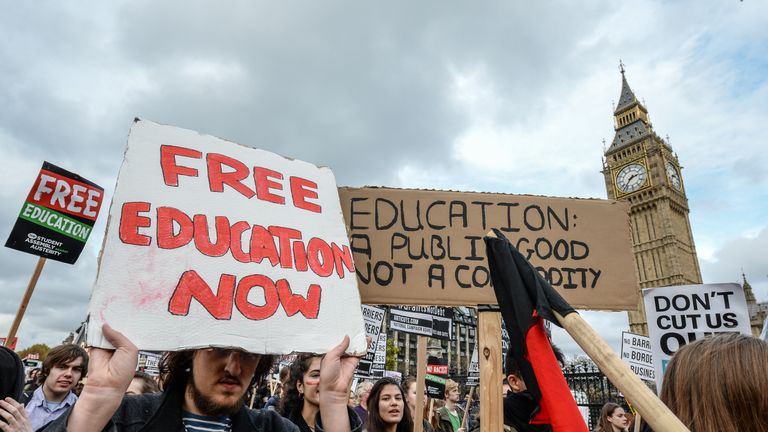 Students march during a demonstration against education cuts on November 4, 2015 in London, England