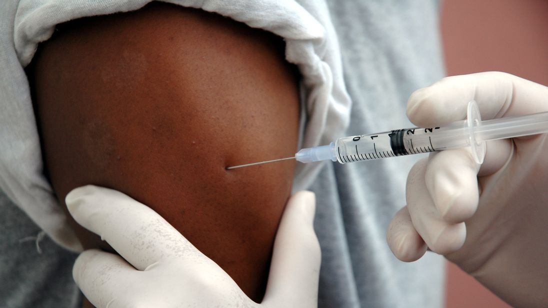 A patient receives an injection