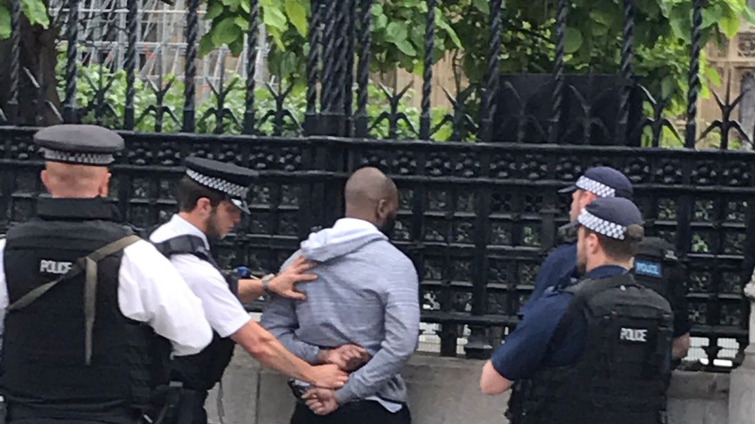 Police arrest a man in Westminster. Pic: @johnaaront