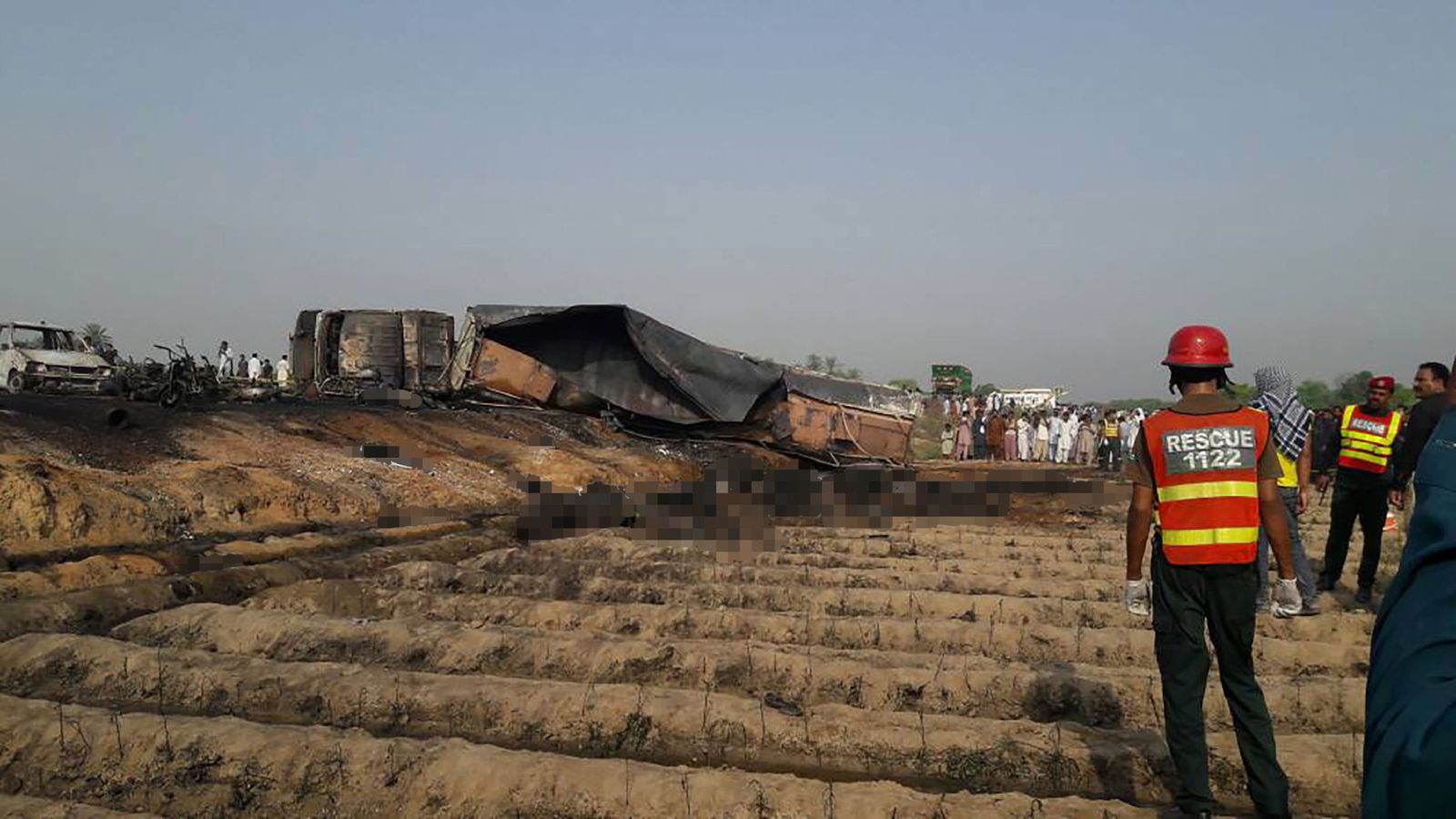 Pakistan oil tanker inferno kills 153 as vehicle explodes while people