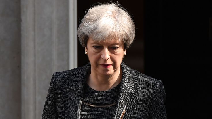 Prime Minister Theresa May leaves 10 Downing Street on June 15