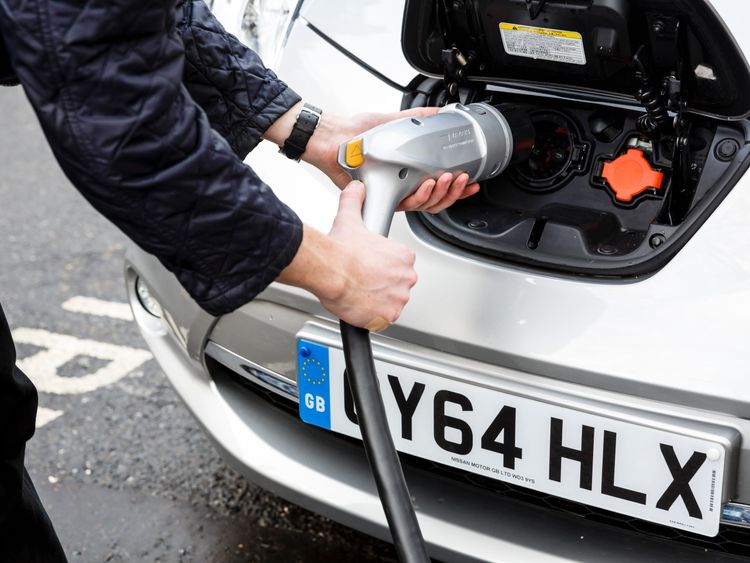 Go Ultra Low Nissan LEAF on charge on a London street.
