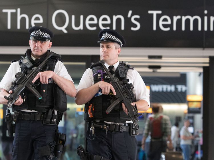 Police officers carry out a patrol in Terminal 2 at Heathrow Airport, west London.