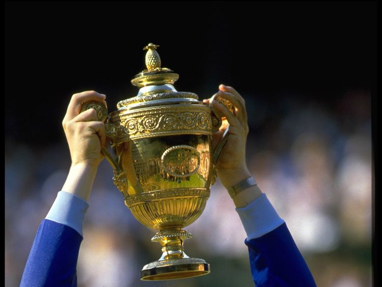 Boris Becker holds Wimbledon men&#39;s singles trophy in 1985