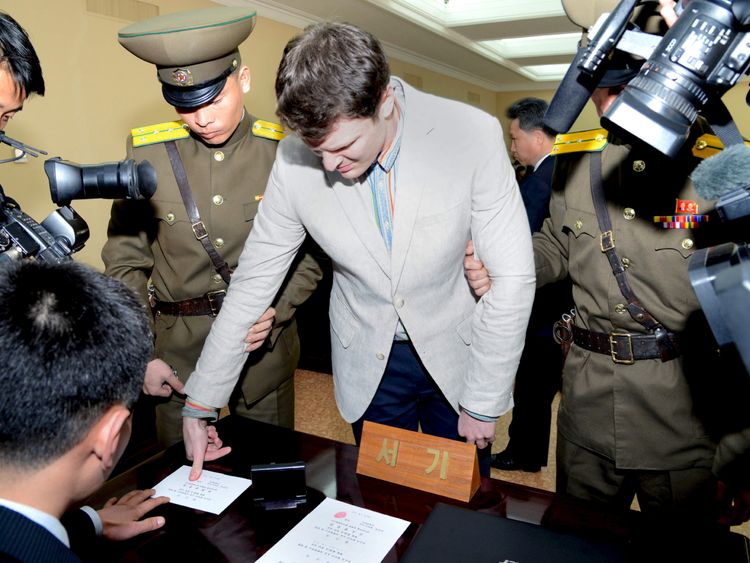 Mr Warmbier has his fingerprints taken at North Korea&#39;s top court