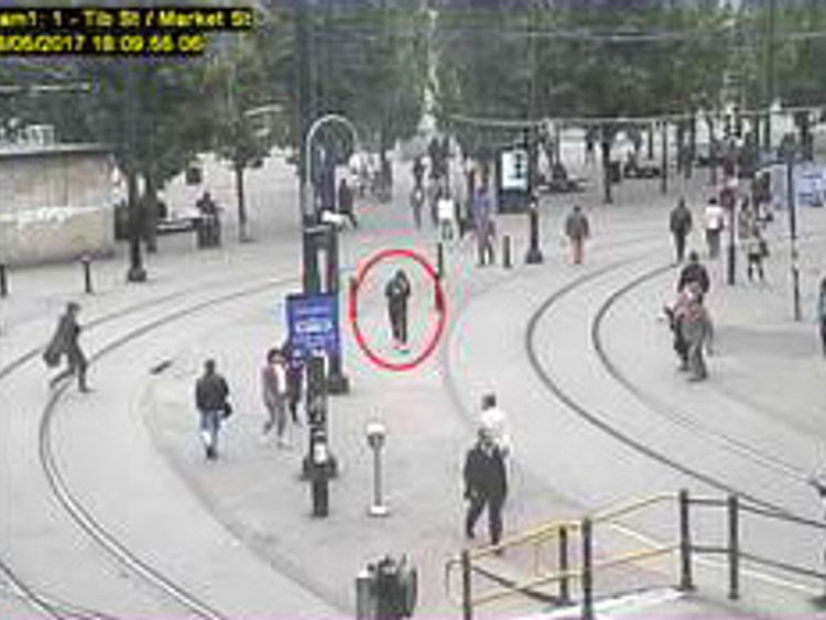 Abedi, circled, captured on TV walking through the town centre