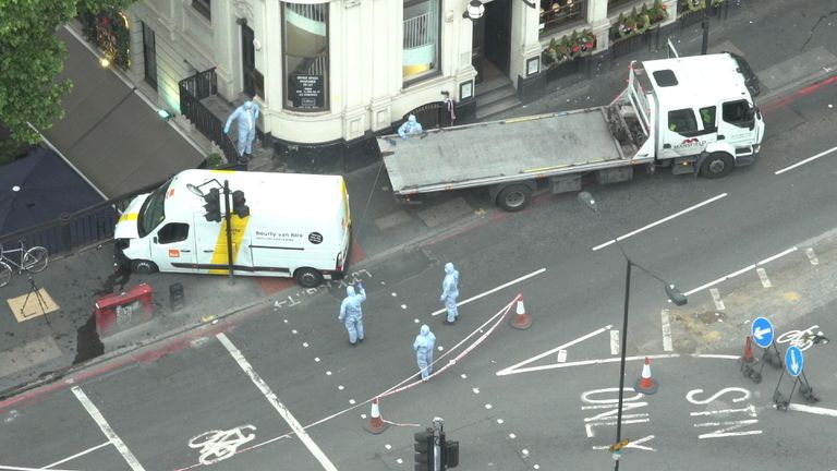 Investigators are removing the hire van used in the attack from the scene