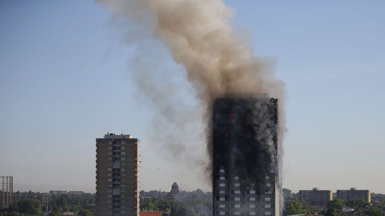 Smoke billows from Grenfell Tower as firefighters attempt to control a huge blaze