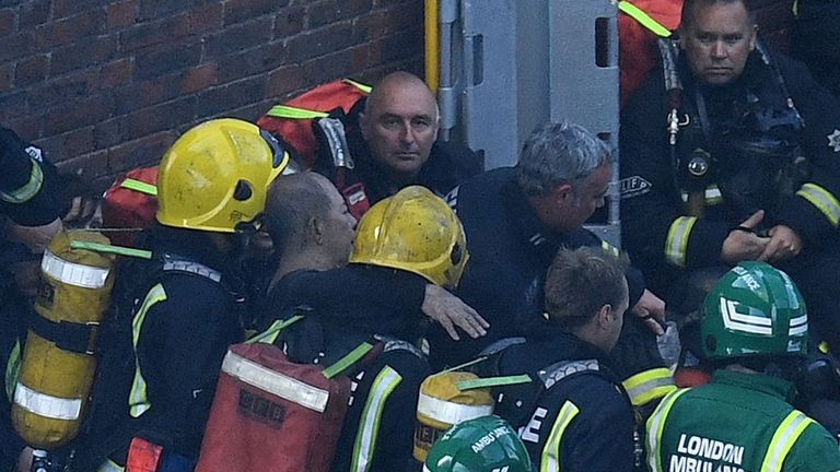 A man is rescued by fire fighters