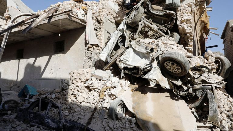 The remains of vehicles are pictured at the ruins of Grand al-Nuri Mosque at the Old City in Mosul