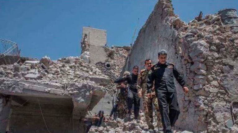 Officers from Iraq's Counter terrorism Service at the Grand al-Nuri Mosque