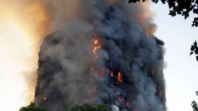 Man seen waving jumper from Grenfell window is rescued after being trapped  in burning building for 12 hours - Mirror Online