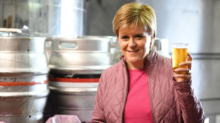 SNP leader Nicola Sturgeon has a ping of beer as she takes a tour of Kelburn Brewery while campaigning for the General Election on June 2, 2017 in Barrhead, East Renfrewshire