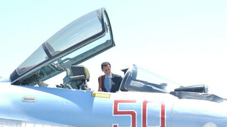Syria&#39;s President Bashar al-Assad visits a Russian air base at Hmeymim, in western Syria 
