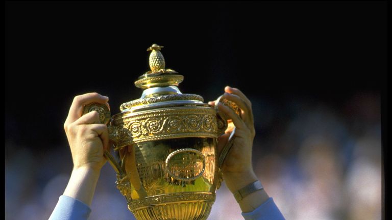 Boris Becker holds Wimbledon men&#39;s singles trophy in 1985