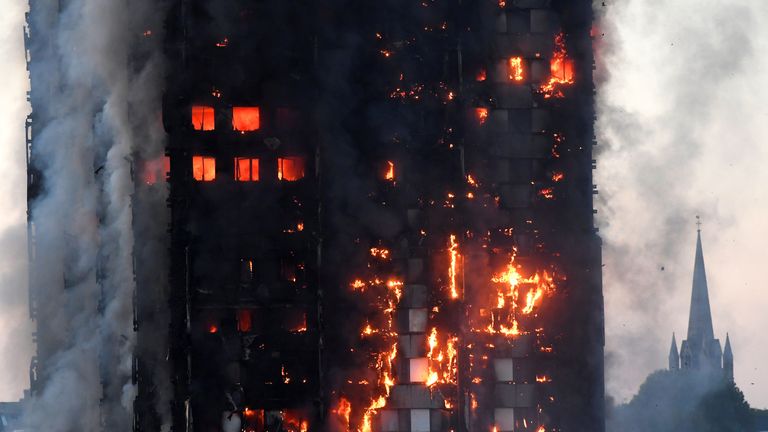 Flames and smoke engulf a tower block, in north Kensington, West London