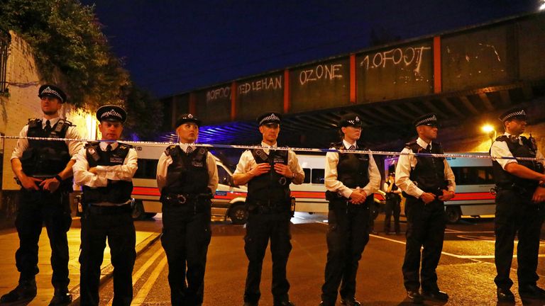 Police guard the scene after a terror attack in Finsbury Park