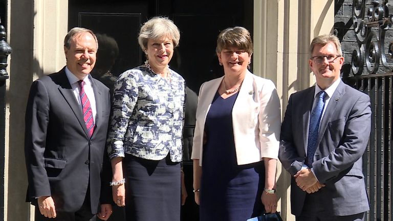Theresa May greets Arlene Foster on the steps of Downing Street