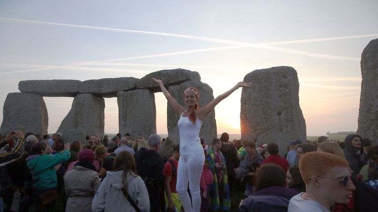 The sun rises at Stonehenge on the summer solstice