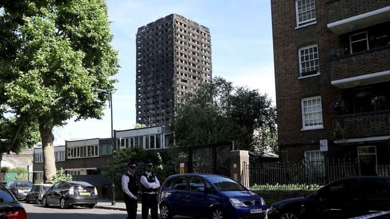 Police stand near Grenfell Tower 