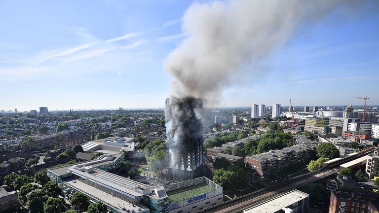 Smoke billows from a fire that has engulfed the 24-storey Grenfell Tower in west London