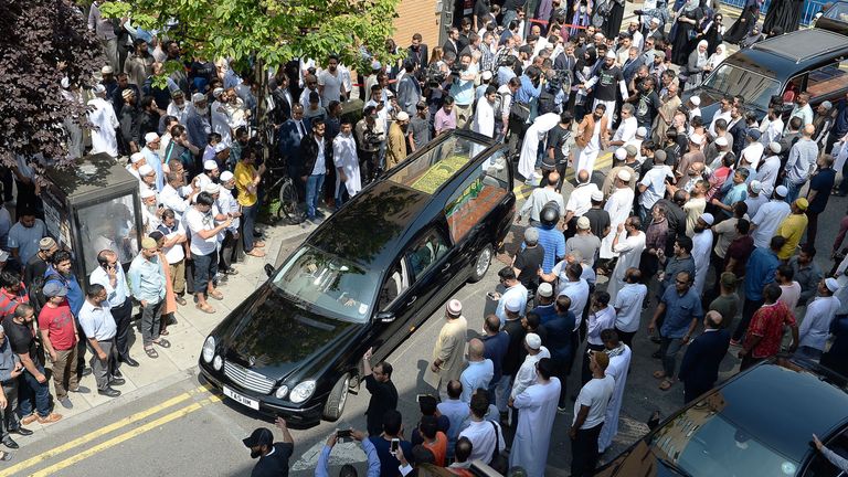 Mohammad Alhajali's coffin is taken from the East London Mosque for his burial
