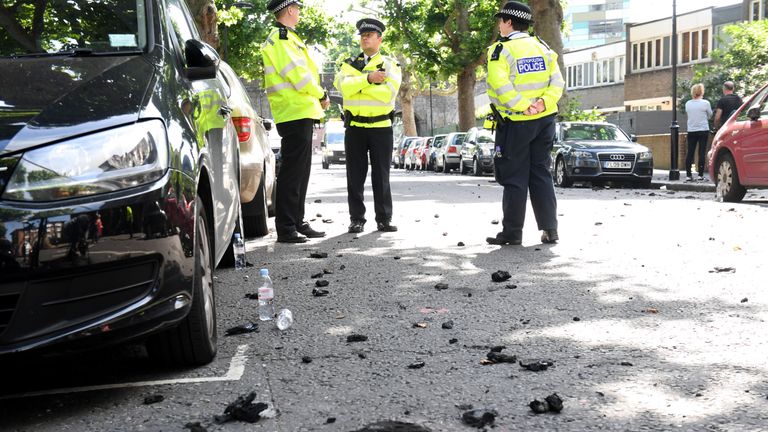 Debris on the ground from a fire that engulfed the 24-storey Grenfell Tower in west London