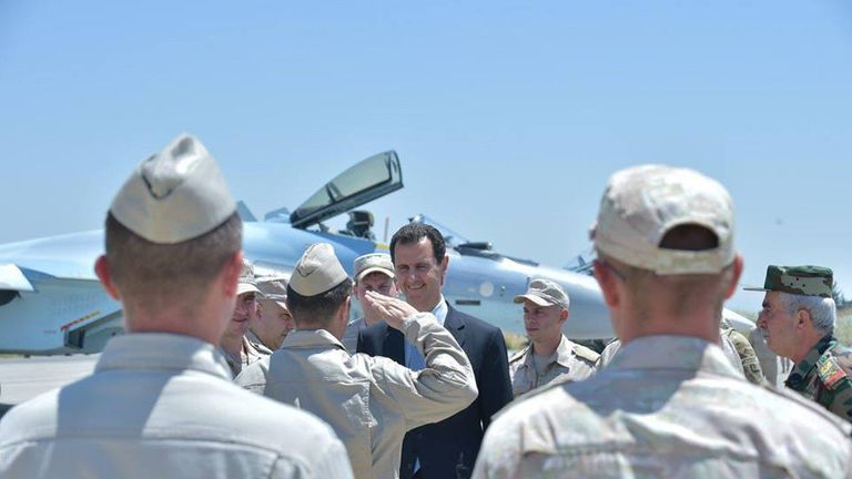 Syria&#39;s President Bashar al-Assad visits a Russian air base at Hmeymim, in western Syria 