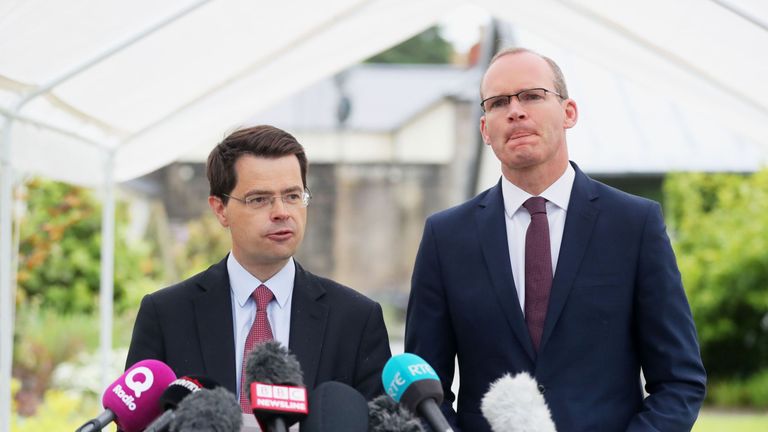 Northern Ireland Secretary James Brokenshire (left) speaks to the media at Stormont, Belfast, while Foreign Affairs minister Simon Coveney looks on