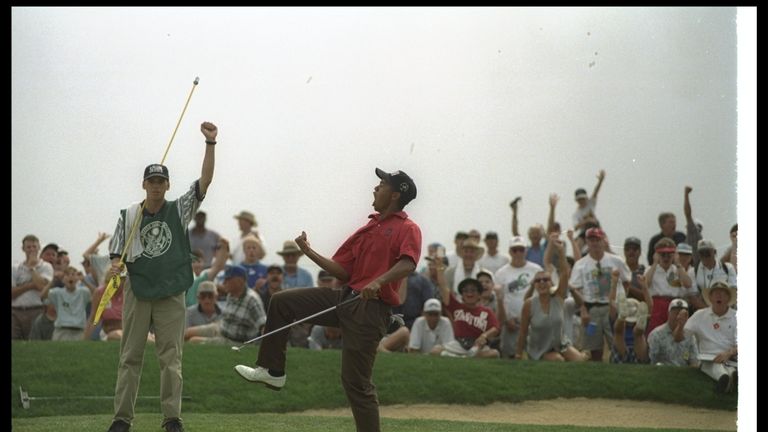 Tiger Woods celebrates a birdy in Oregon in 1996