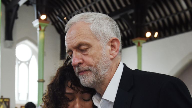 Jeremy Corbyn comforts a resident at St Clement&#39;s Church