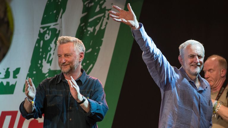 Labour Party leader Jeremy Corbyn on stage with Billy Bragg 
